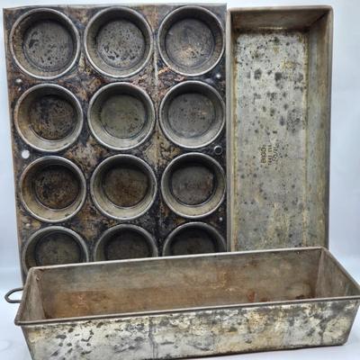 LOT 36: Vintage Kitchen Gadgets Including Hand Held Ice Crusher, Potato Masher, Cheese Graters, Can Opener, and More
