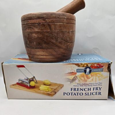 LOT 37: Kitchen Cabinet Lot Including Salt and Pepper Shakers, Vintage Coffee Pot, Coasters, Mortar and Pestle, and More