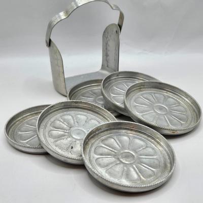 LOT 37: Kitchen Cabinet Lot Including Salt and Pepper Shakers, Vintage Coffee Pot, Coasters, Mortar and Pestle, and More