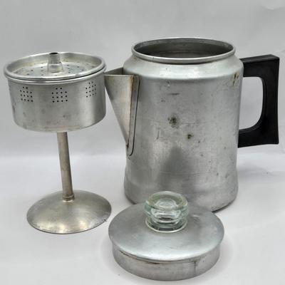 LOT 37: Kitchen Cabinet Lot Including Salt and Pepper Shakers, Vintage Coffee Pot, Coasters, Mortar and Pestle, and More