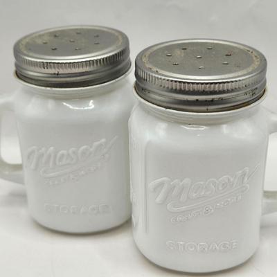 LOT 37: Kitchen Cabinet Lot Including Salt and Pepper Shakers, Vintage Coffee Pot, Coasters, Mortar and Pestle, and More