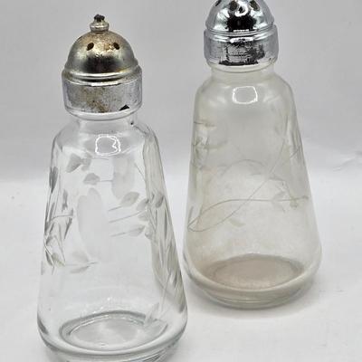 LOT 37: Kitchen Cabinet Lot Including Salt and Pepper Shakers, Vintage Coffee Pot, Coasters, Mortar and Pestle, and More
