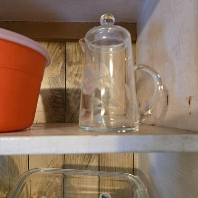 LOT 38: Kitchen Cabinet Lot: Tupperware Egg Tray, Avocado Green Napkin Holder & Salt/Pepper Shakers Strawberry Mugs, Glass Pie Pans,...