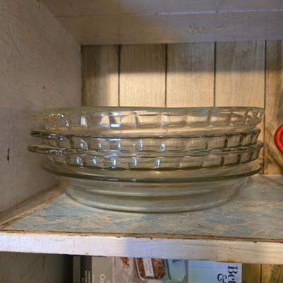 LOT 38: Kitchen Cabinet Lot: Tupperware Egg Tray, Avocado Green Napkin Holder & Salt/Pepper Shakers Strawberry Mugs, Glass Pie Pans,...