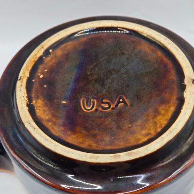 LOT 49: Various Pfaltzgraff, McCoy, and Other Brown Dripped Glaze Pottery Pieces