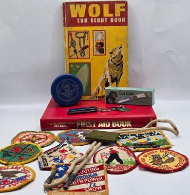 LOT 111: Cub Scout Book, First Aid Book, Boy Scout Patches, GI Joe Pocket Knife, Collapsible Cup, and More