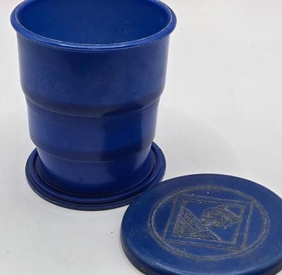 LOT 111: Cub Scout Book, First Aid Book, Boy Scout Patches, GI Joe Pocket Knife, Collapsible Cup, and More