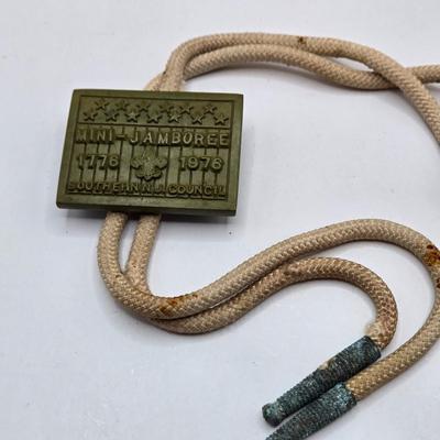 LOT 111: Cub Scout Book, First Aid Book, Boy Scout Patches, GI Joe Pocket Knife, Collapsible Cup, and More