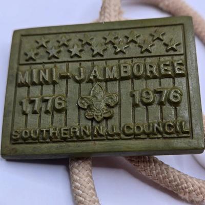 LOT 111: Cub Scout Book, First Aid Book, Boy Scout Patches, GI Joe Pocket Knife, Collapsible Cup, and More