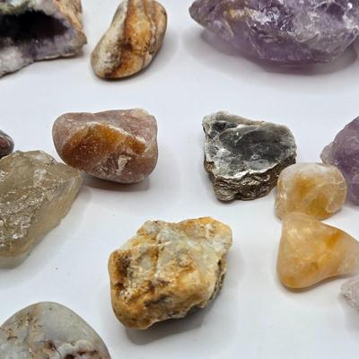 LOT 112: 2025 Astrology Calendar, Crystal Growing Kit, and Various Rocks and Crystals