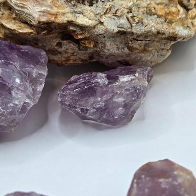LOT 112: 2025 Astrology Calendar, Crystal Growing Kit, and Various Rocks and Crystals