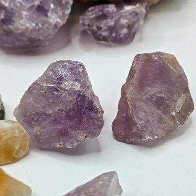LOT 112: 2025 Astrology Calendar, Crystal Growing Kit, and Various Rocks and Crystals