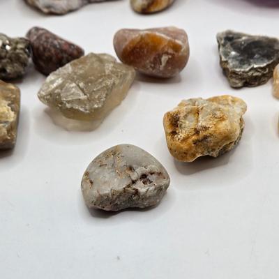 LOT 112: 2025 Astrology Calendar, Crystal Growing Kit, and Various Rocks and Crystals