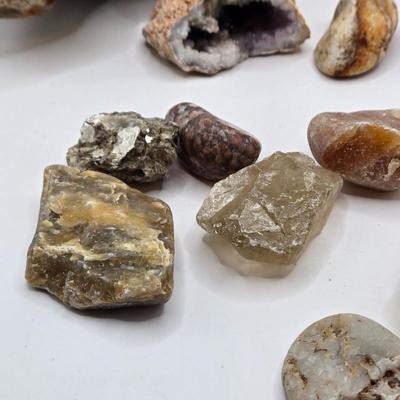LOT 112: 2025 Astrology Calendar, Crystal Growing Kit, and Various Rocks and Crystals