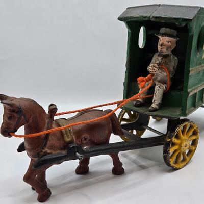 LOT 115: Vintage Cast Iron Brooke Bond Horse Drawn Wagon and Model T