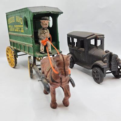 LOT 115: Vintage Cast Iron Brooke Bond Horse Drawn Wagon and Model T