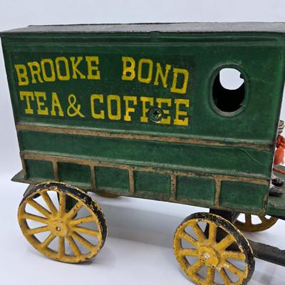 LOT 115: Vintage Cast Iron Brooke Bond Horse Drawn Wagon and Model T