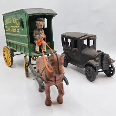 LOT 115: Vintage Cast Iron Brooke Bond Horse Drawn Wagon and Model T