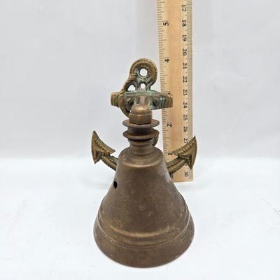 LOT 118: Vintage Boat Light, Ships Bell, Dock Cleat, and More