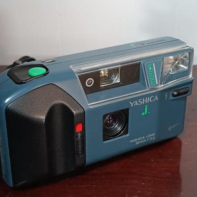 LOT 149: Canon Sure Shot WP-1, Canon NB-6LH Compatible Batteries, Quantaray Tripod & More