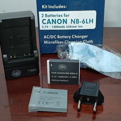 LOT 149: Canon Sure Shot WP-1, Canon NB-6LH Compatible Batteries, Quantaray Tripod & More