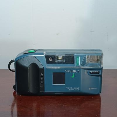 LOT 149: Canon Sure Shot WP-1, Canon NB-6LH Compatible Batteries, Quantaray Tripod & More