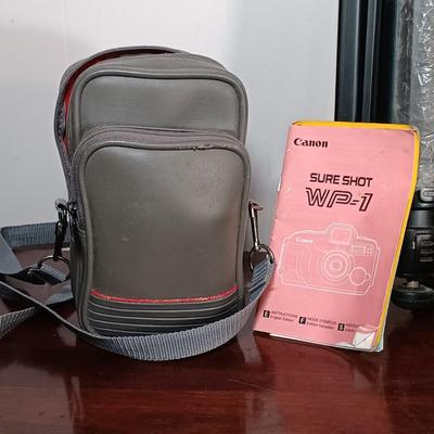 LOT 149: Canon Sure Shot WP-1, Canon NB-6LH Compatible Batteries, Quantaray Tripod & More