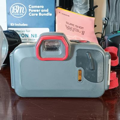 LOT 149: Canon Sure Shot WP-1, Canon NB-6LH Compatible Batteries, Quantaray Tripod & More