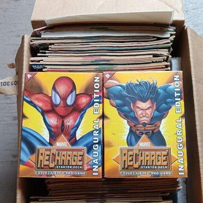 LOT 152: Marvel ReCharge Starter Decks, Wheaties 75 Years of Champions Cards & Large Lot of Comic Books