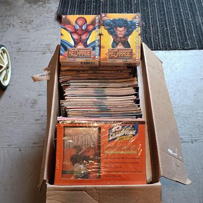 LOT 152: Marvel ReCharge Starter Decks, Wheaties 75 Years of Champions Cards & Large Lot of Comic Books