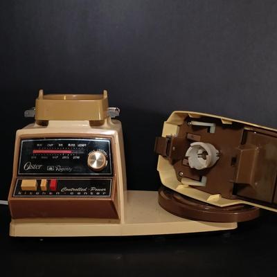 LOT 154: Oster Foodcrafter Regency Kitchen Center and Accessories along with a Hand Crank Food Processor
