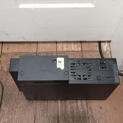 LOT 173: Vintage Console Lot- RadioShack TV ScoreBoard, Playstation 2 SCPH-50001, Atari 2600 with Accessories & More