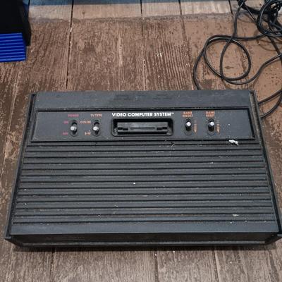 LOT 173: Vintage Console Lot- RadioShack TV ScoreBoard, Playstation 2 SCPH-50001, Atari 2600 with Accessories & More