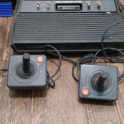 LOT 173: Vintage Console Lot- RadioShack TV ScoreBoard, Playstation 2 SCPH-50001, Atari 2600 with Accessories & More