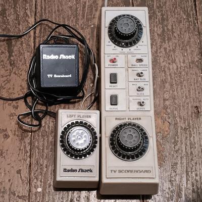 LOT 173: Vintage Console Lot- RadioShack TV ScoreBoard, Playstation 2 SCPH-50001, Atari 2600 with Accessories & More