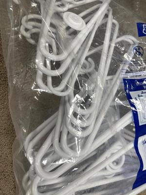 Bag of white hangers