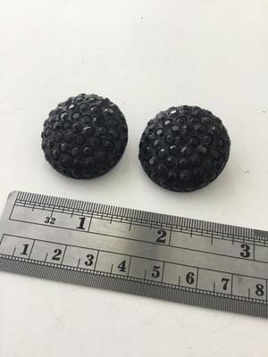 Vintage black round clip on earrings