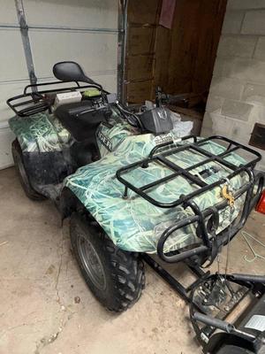 2006 Suzuki Fourwheeler with plow