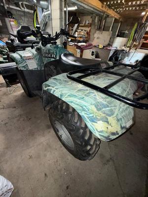 2006 Suzuki Fourwheeler with plow