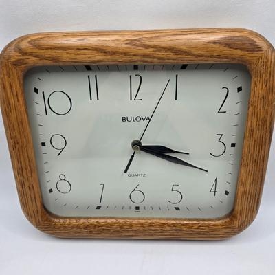 LOT 75L: Bulova Clock, Cucina Plaque, 2 Blue Baskets, Cute Bunny Flatware Holders, Large Plastic Bowl, Ice Bucket, and More