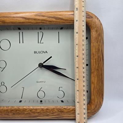 LOT 75L: Bulova Clock, Cucina Plaque, 2 Blue Baskets, Cute Bunny Flatware Holders, Large Plastic Bowl, Ice Bucket, and More
