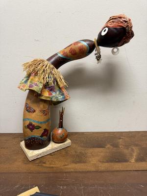 Gourd Lady from Africa with turban and earrings mounted on base