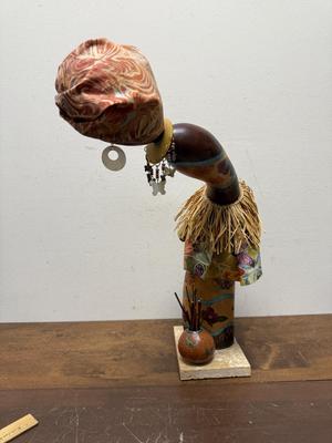 Gourd Lady from Africa with turban and earrings mounted on base