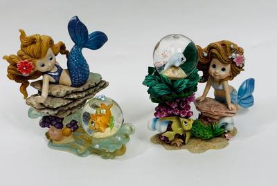 Sale Photo Thumbnail #120: Limited edition pieces, In fair to good, previously owned condition.  The lighter blue mermaid has a chip off her hair that is not very noticeable.