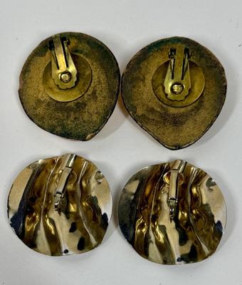 Sale Photo Thumbnail #157: One pair resembles a set of miniature abalone shells, the other an abstract banded circular swirl pattern. Both in good condition.