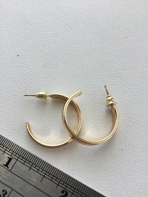 Gold tone small hoop earrings