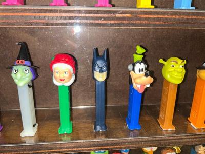DISPLAY CASE LOADED WITH PEZ DISPENSERS