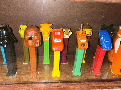 DISPLAY CASE LOADED WITH PEZ DISPENSERS