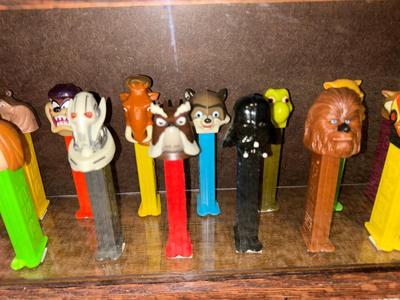 DISPLAY CASE LOADED WITH PEZ DISPENSERS