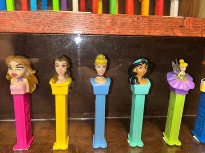 DISPLAY CASE LOADED WITH PEZ DISPENSERS
